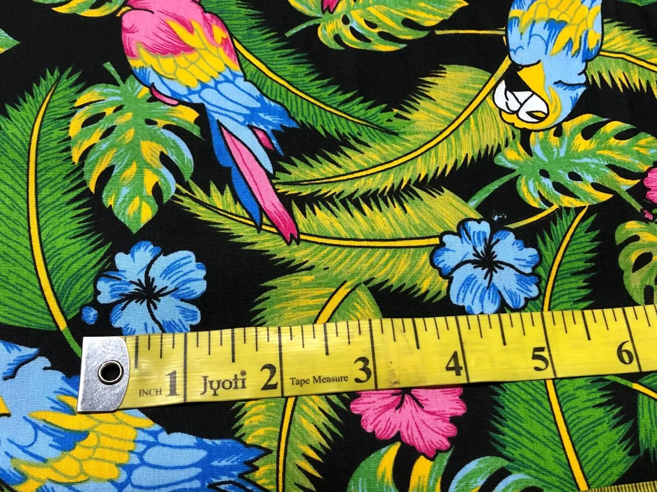 100% Cotton Poplin PRINT   58" wide RETRO BEACH available in 3 different prints pink ,orange, blue ,yellow ,green waves / black jungle with pink and blue parrots and flowers AND blue with lavender pink flowers