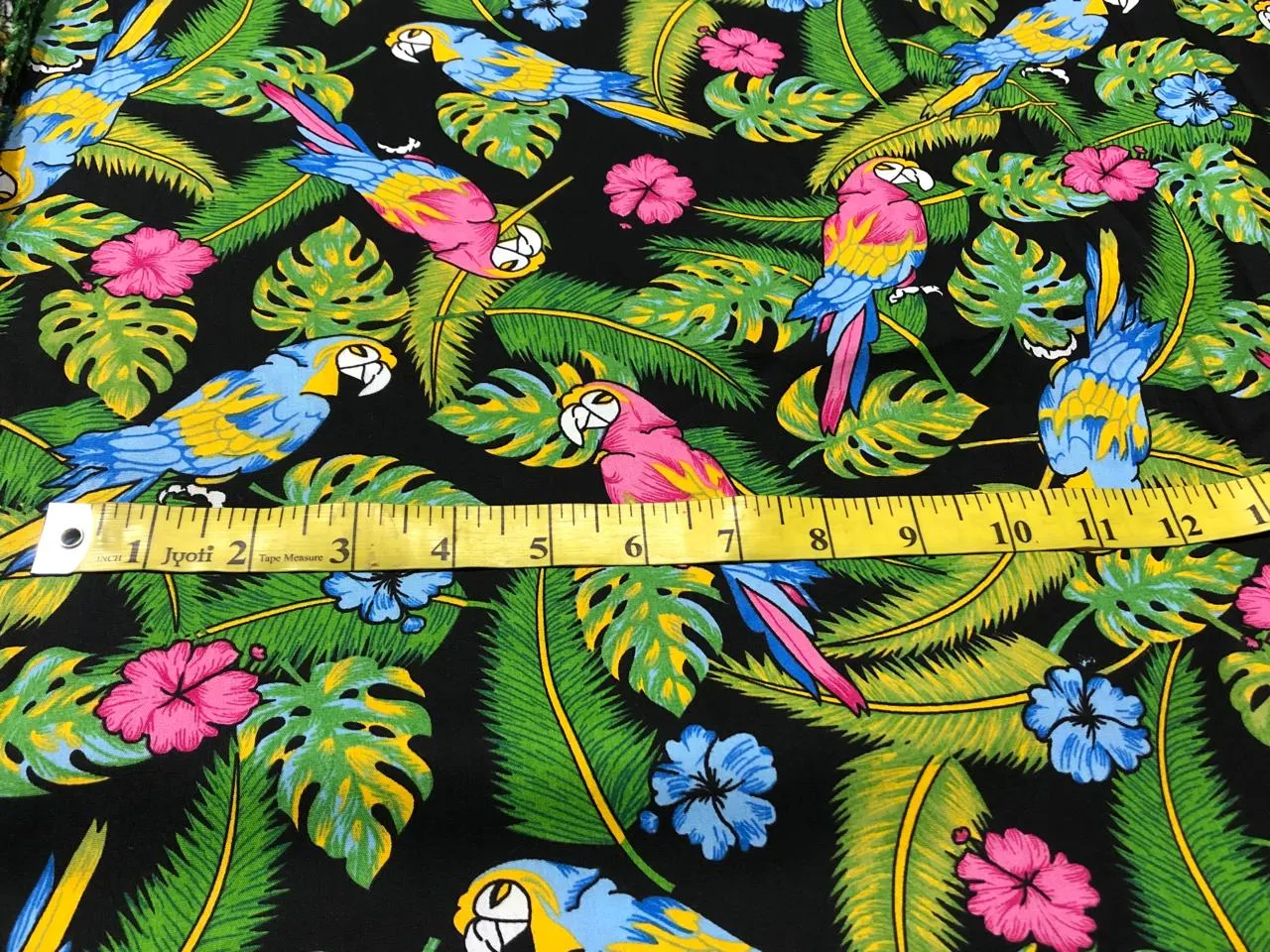 100% Cotton Poplin PRINT   58" wide RETRO BEACH available in 3 different prints pink ,orange, blue ,yellow ,green waves / black jungle with pink and blue parrots and flowers AND blue with lavender pink flowers