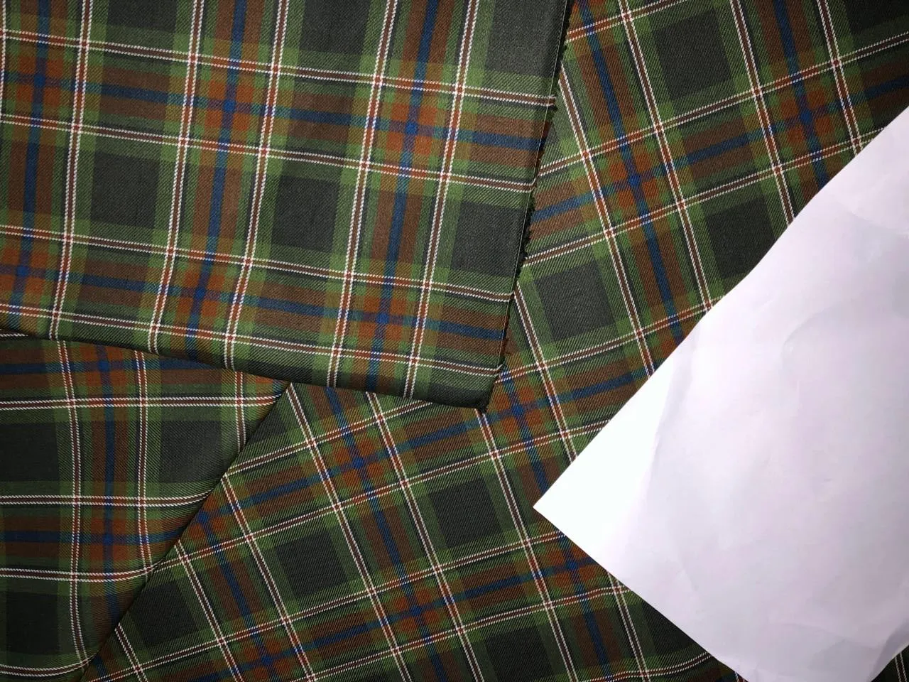 100% Cotton twill  plaids with  available in 4 colors REDS, BLUES and GREENS/GREEN,RUSTY BROWN , BLUE AND BROWN,WHITE AND BLUE AND GREEN AND BLACK