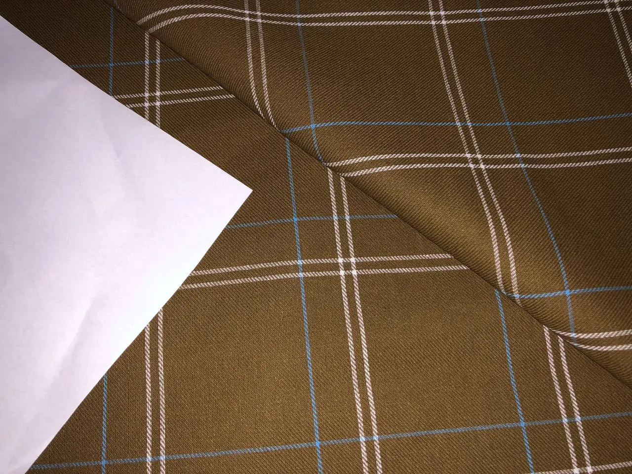 100% Cotton twill  plaids with  available in 4 colors REDS, BLUES and GREENS/GREEN,RUSTY BROWN , BLUE AND BROWN,WHITE AND BLUE AND GREEN AND BLACK